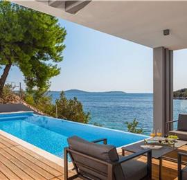 Luxury Beachfront Villa with Heated Infinity Pool near Trogir, Sleeps 8